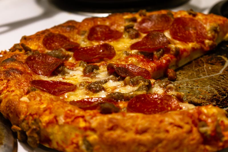 Sausage and pepper deep dish pizza Chicago style